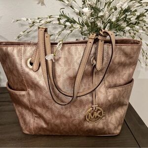 PRICE DROP! Michael Kors Gold Tote with Spacious Design and Luxurious Finish